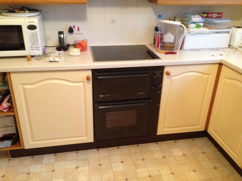 This was a job I carried out in Bramhall where we painted kitchen doors to match the natural wood used elsewhere in the kitchen.