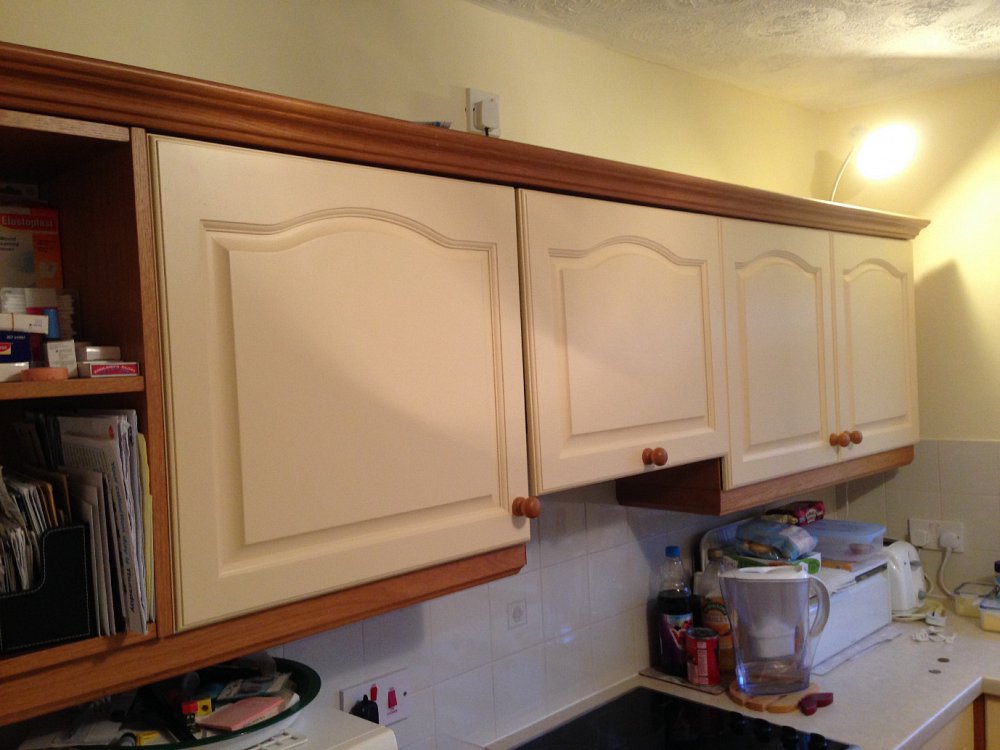 Painting doors to blend in with natural wood