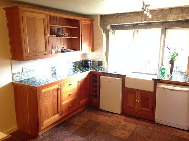 Before. The original hand built pine kitchen.