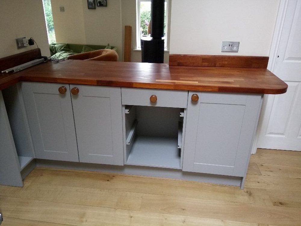 Respraying MDF doors in a kitchen in Didsbury - After