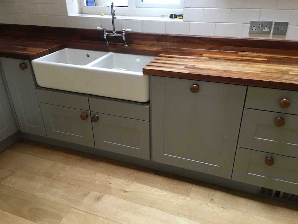 Respraying MDF doors in a kitchen in Didsbury - After