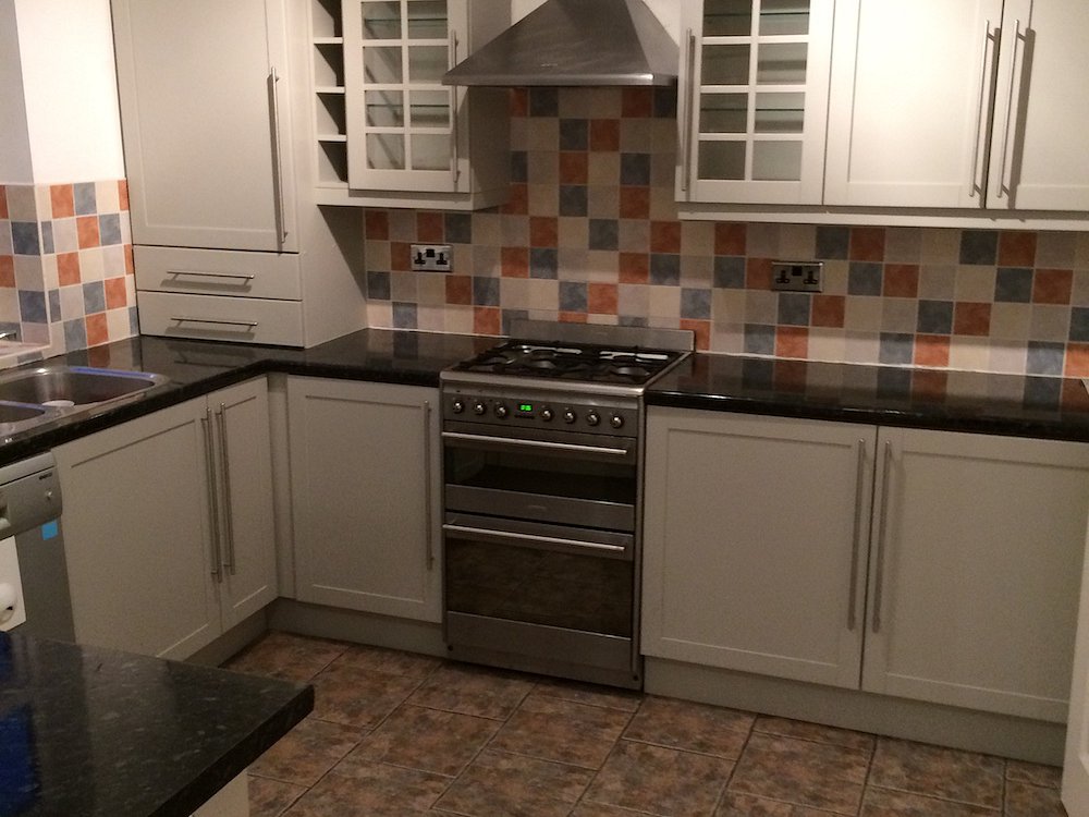 Resprayed stained cherry kitchen in Bramhall