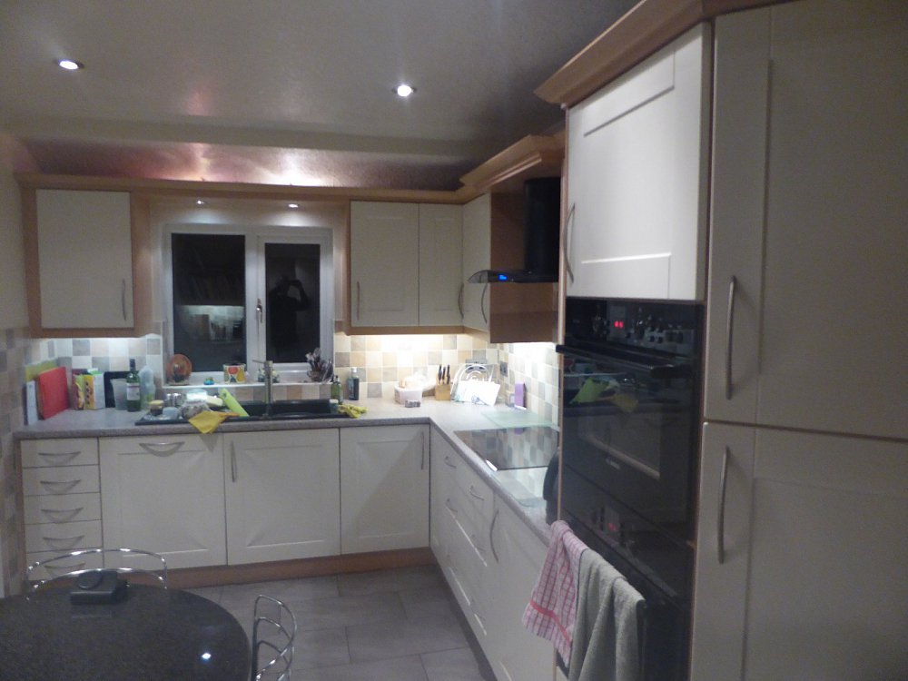 Replacing poor quality vinyl doors with solid wood
